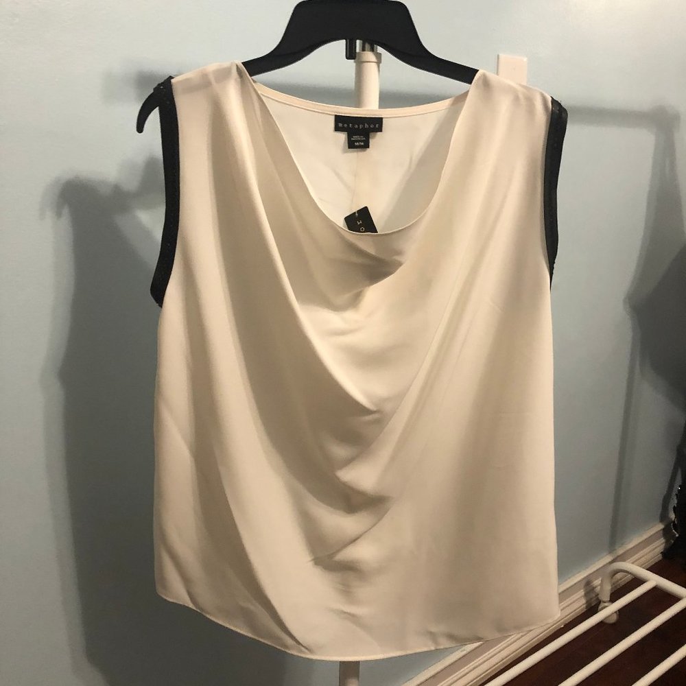 white blouse, with leather details on sleeve